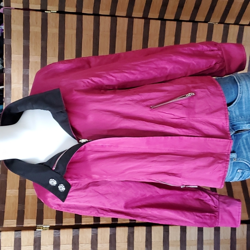Reversible jacket, pink on one side, black other